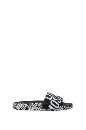 Love Moschino Slippers and clogs Women Polyurethane Black