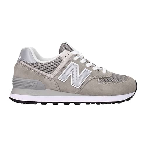 New Balance 574 sneakers in white and pale gray