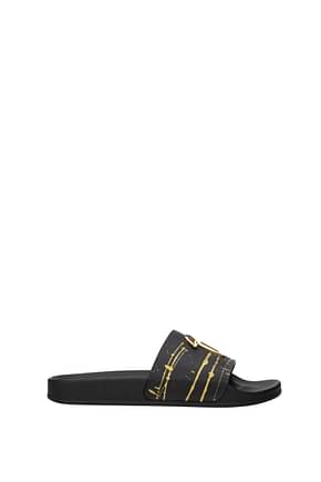 Giuseppe Zanotti Slippers and clogs Men Leather Black Gold