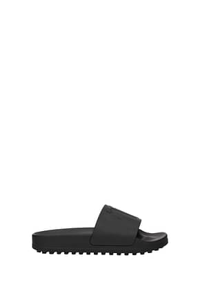 Tod's Slippers and clogs Men Rubber Black