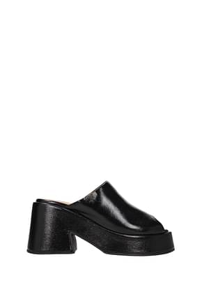Ganni Slippers and clogs Women Patent Leather Black