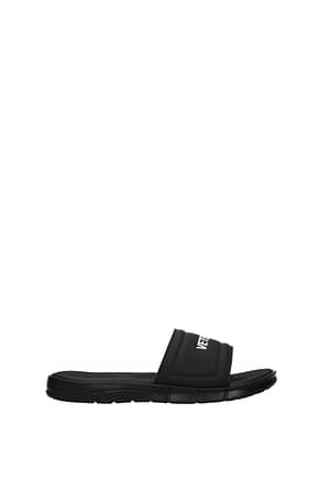 Vetements Slippers and clogs Men Rubber Black
