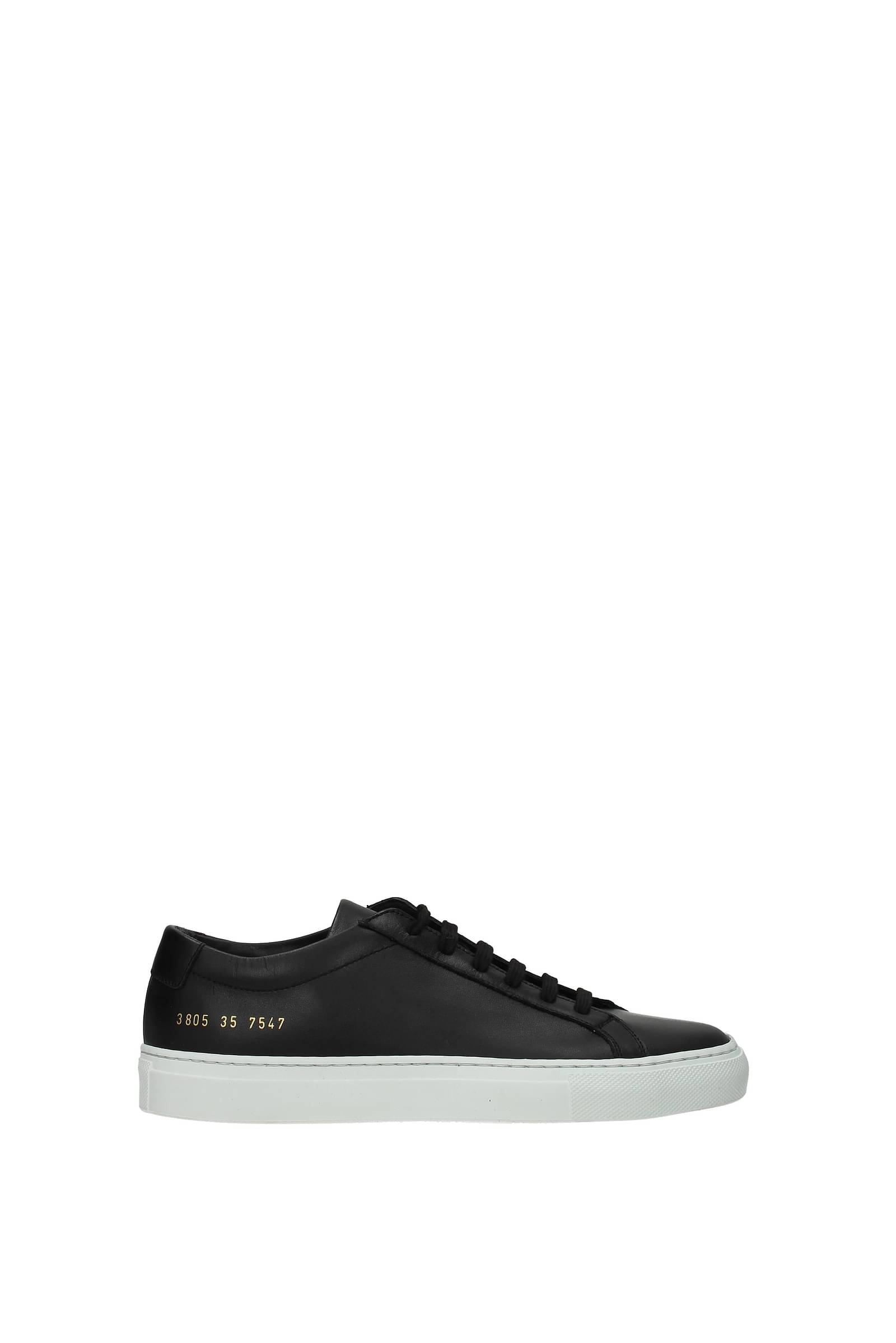 woman by common projects sneakers