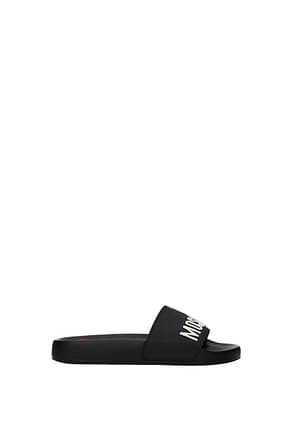 Love Moschino Slippers and clogs Women Rubber Black
