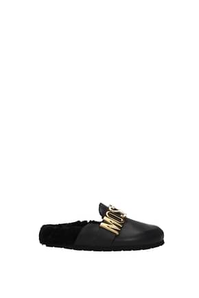Moschino Slippers and clogs Women Leather Black